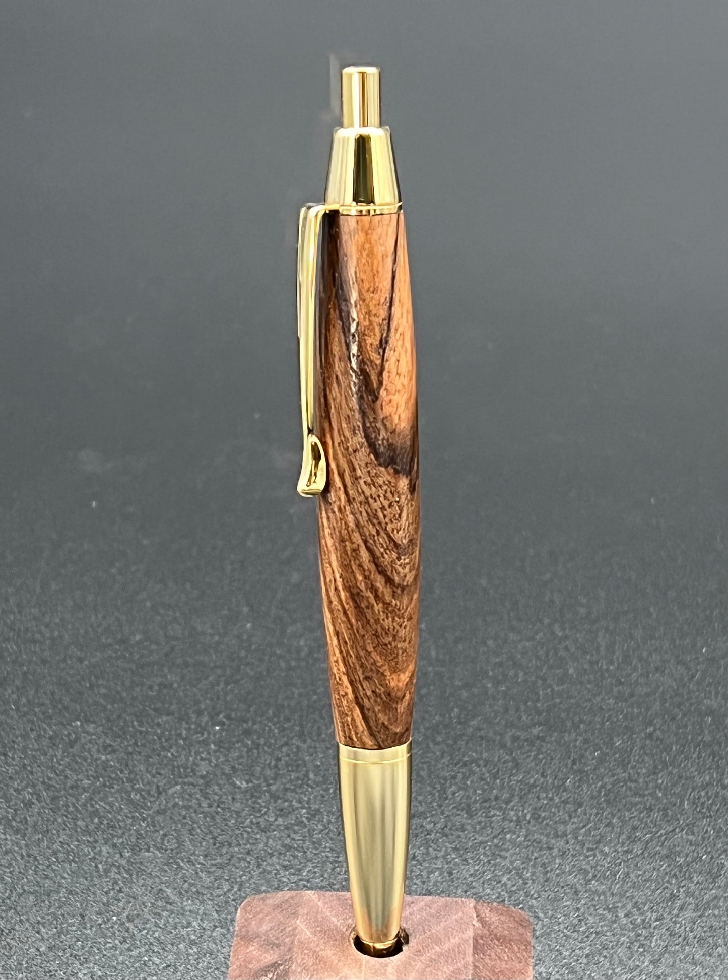 The Devin 24kt gold click pen in diagonal cut Rosewood